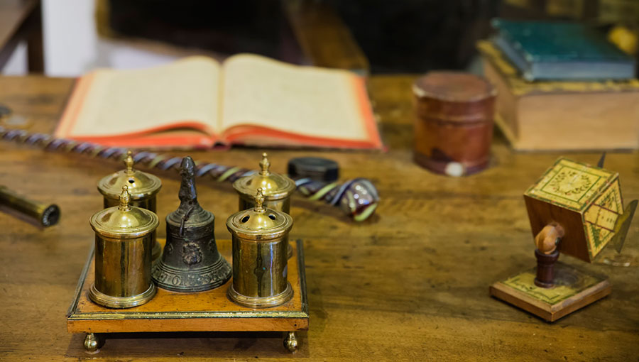 desk with antique bells