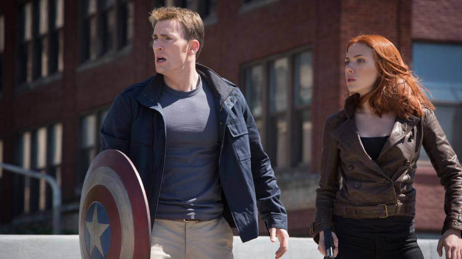 Steve Rogers (Chris Evans) and Natasha Romanov (Scarlett Johanssen) stare in awe in a scene from The Winter Soldier.