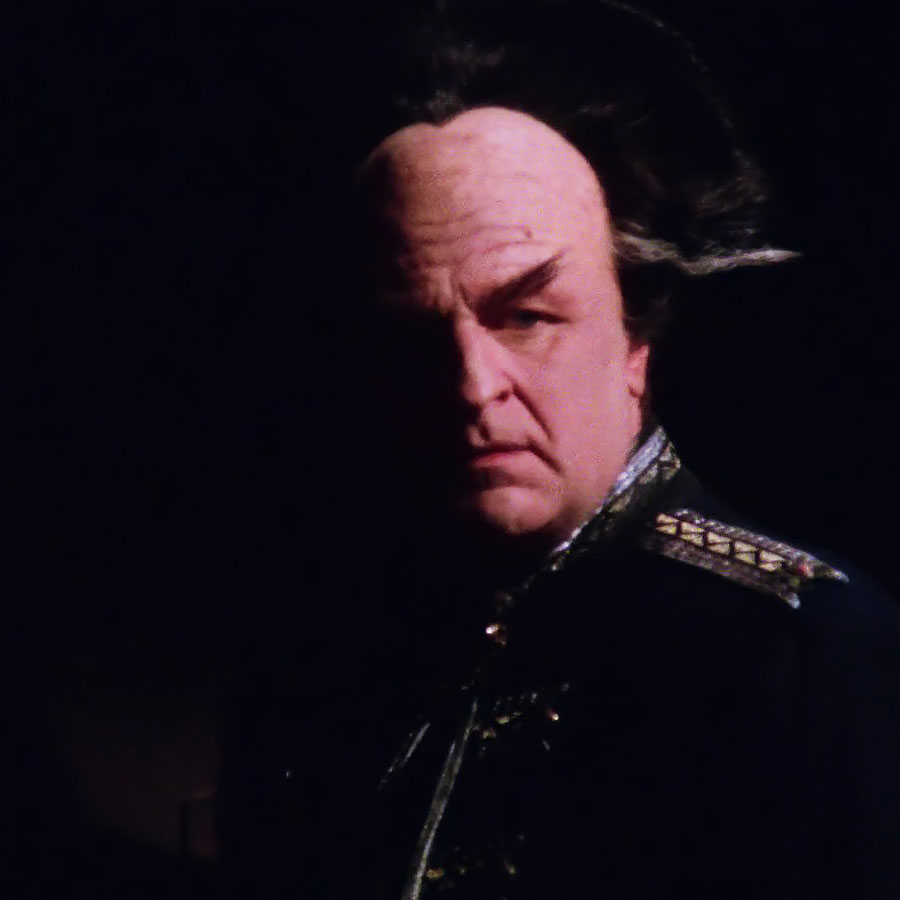 Londo Mollari's face is partially shadowed in a scene from Babylon 5.