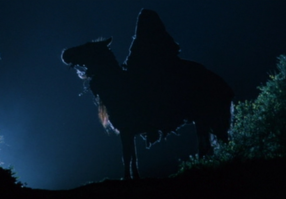 Screenshot of a lone Nazgul on horseback in "The Fellowship of the Ring" motion picture.