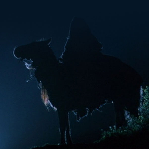 Screenshot of a lone Nazgul on horseback in "The Fellowship of the Ring" motion picture.